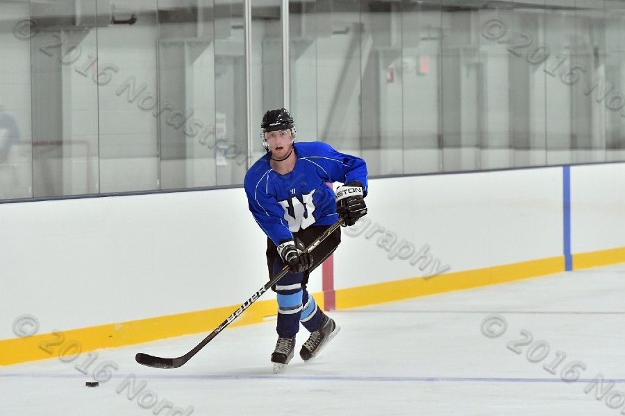 Wheaton College Men\'s Ice Hockey vs Middlesex Community College. - Photo By: KEITH NORDSTROM